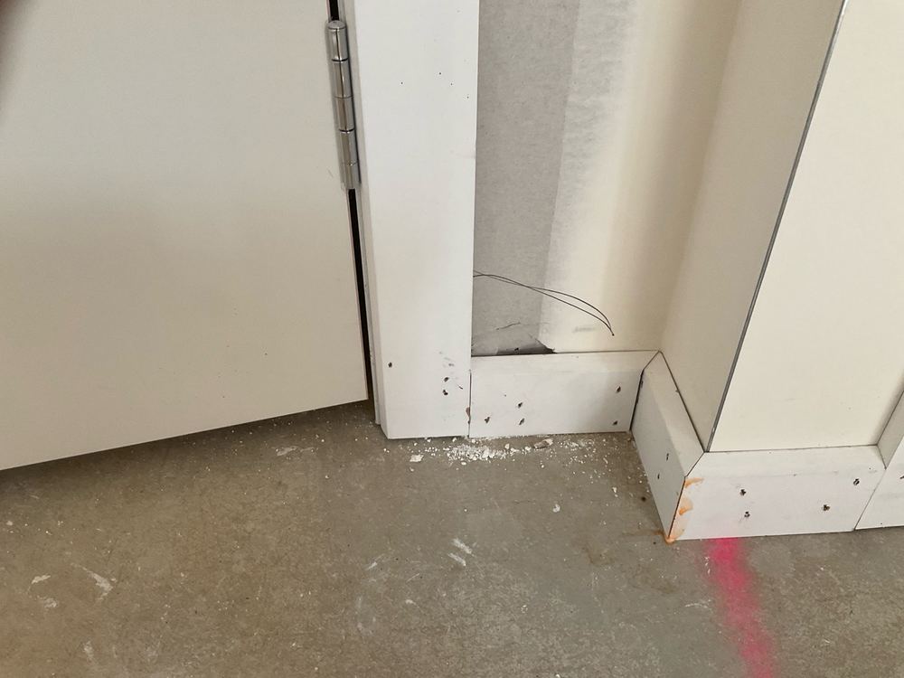 Damaged plaster that needs patching and sanding before the painter starts, Clyde North