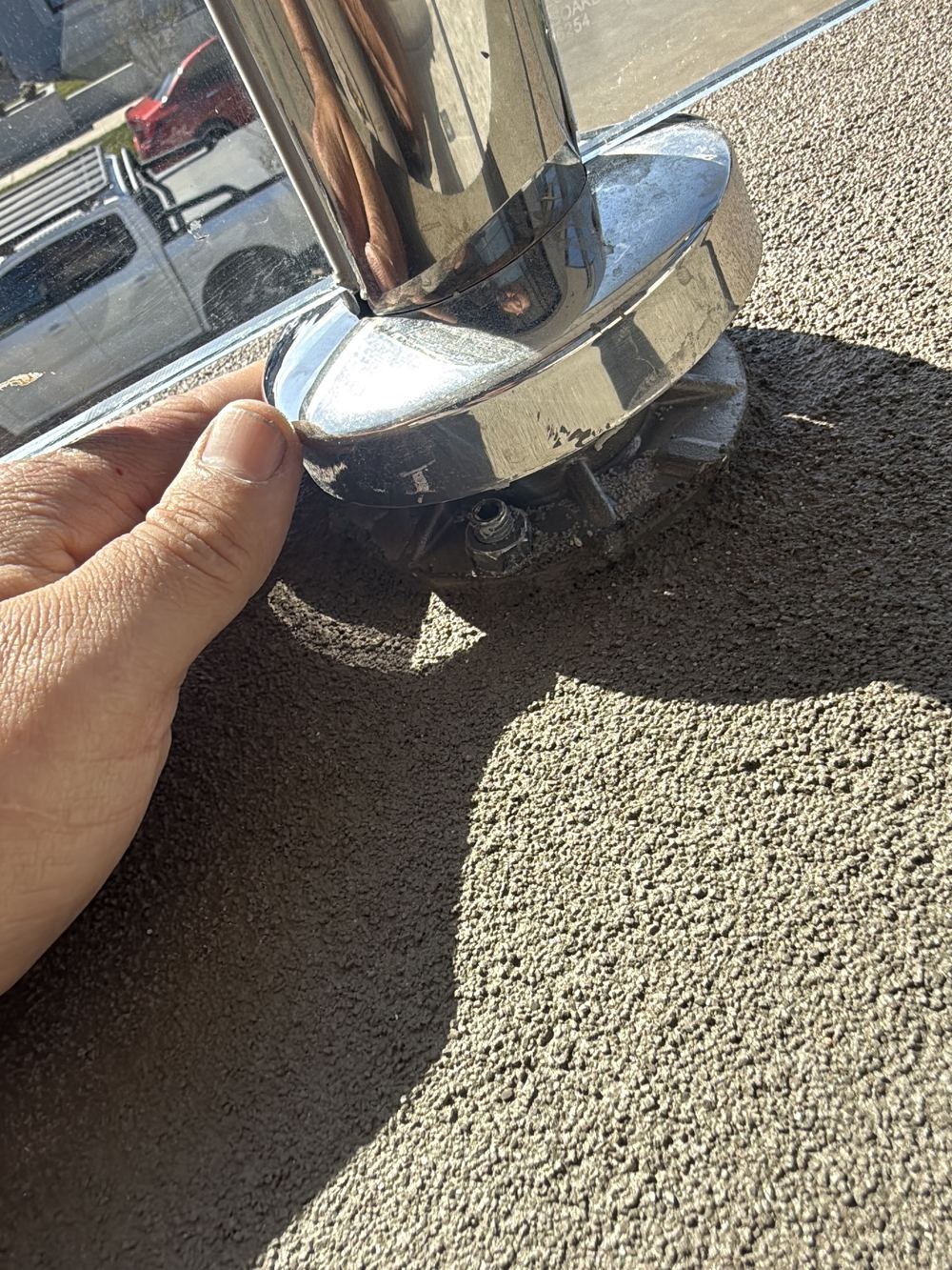 Balustrade bolted down through the top of the balcony hob, piercing the waterproofing, found during a pre-handover inspection in Clyde North