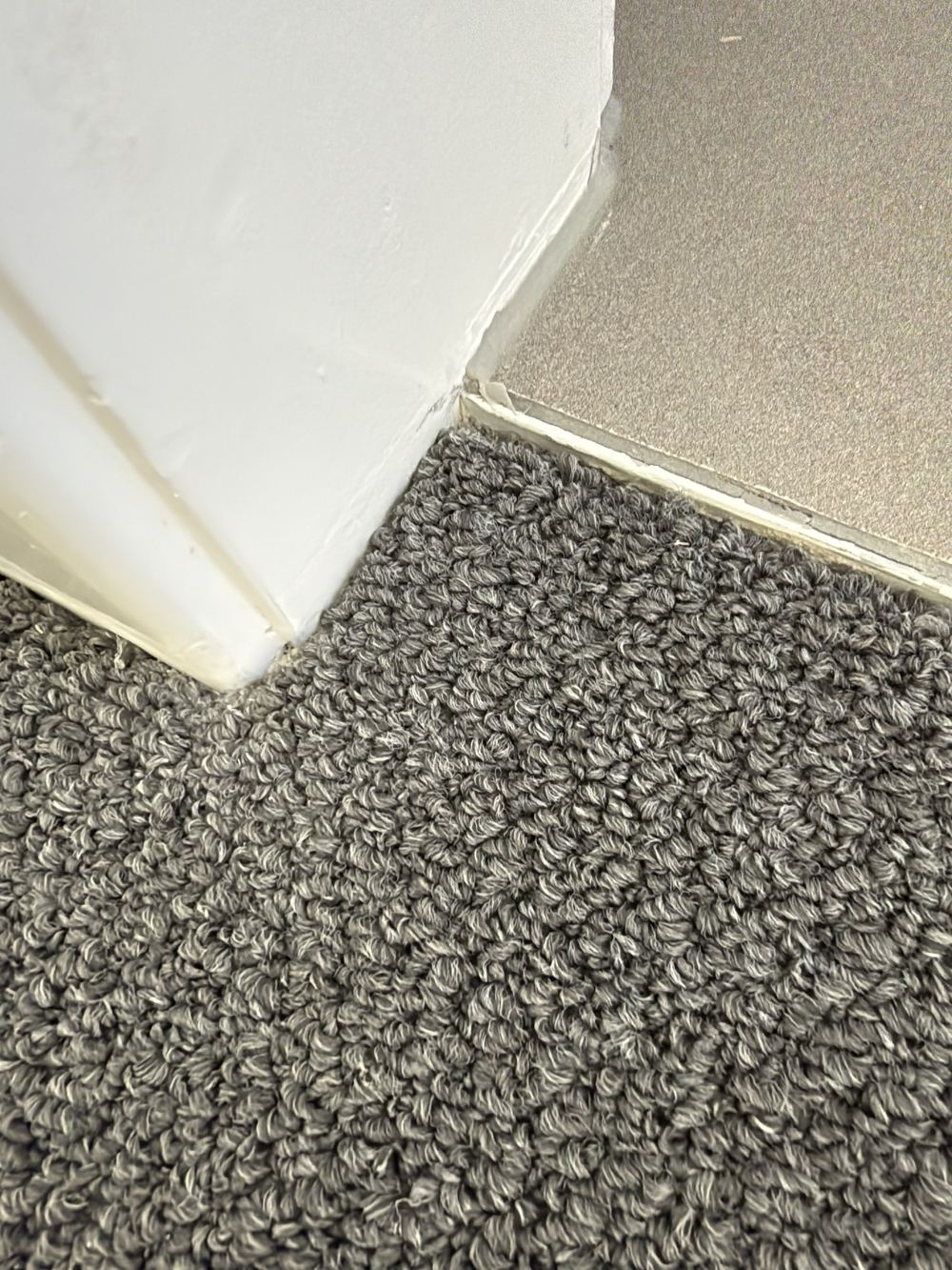 Door threshold water stop too short to meet the wall flashing, found during a pre-handover inspection in Clyde North