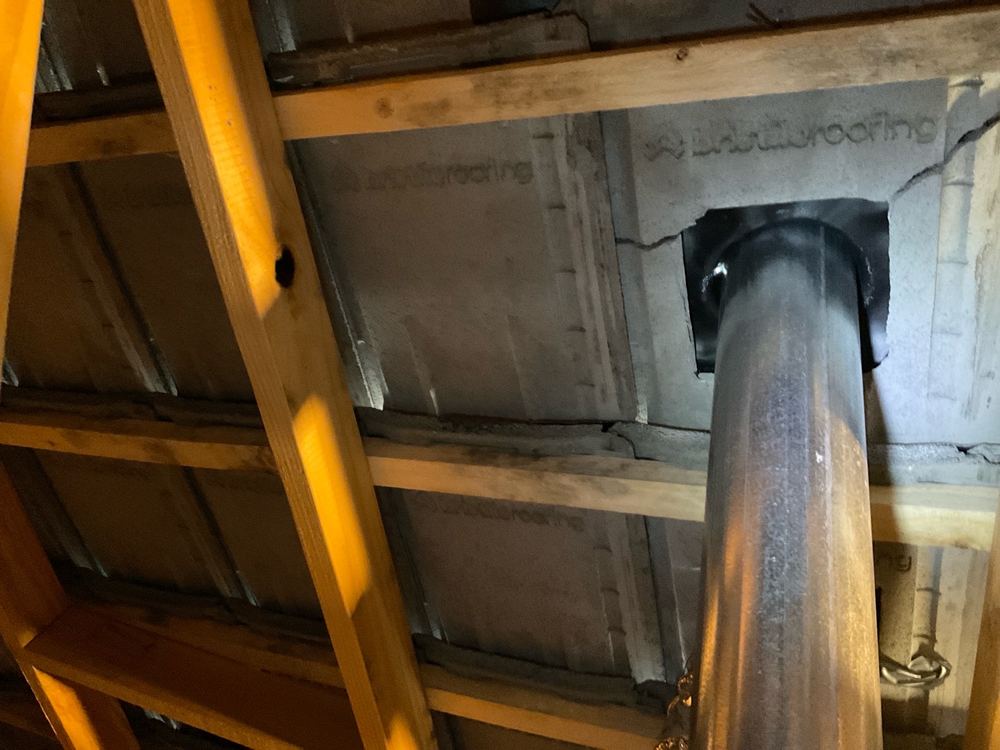 Roof vent flashing damaged and needing resealing before the keys change hands, found during a pre-handover inspection in Clyde North